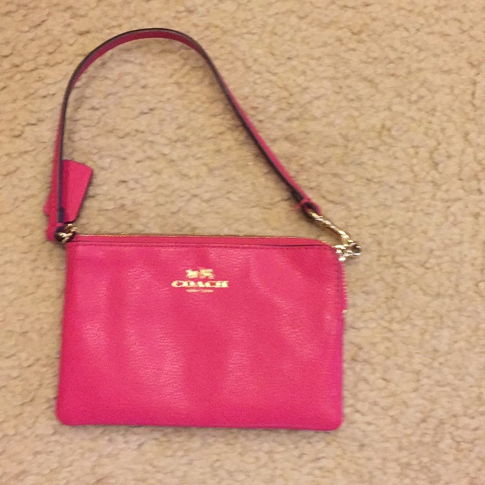 COACH pink wristlet